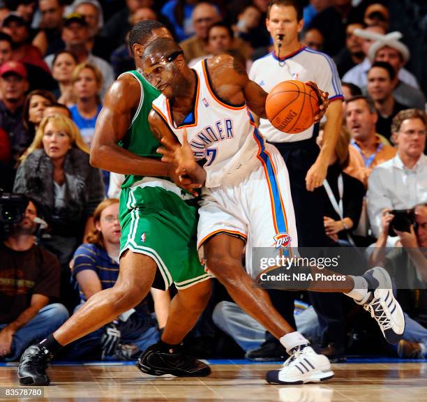 Joe Smith of the Oklahoma City Thunder goes to the basket while being guarded by Tony Allen of the Boston Celtics at the Ford Center on November 5,...