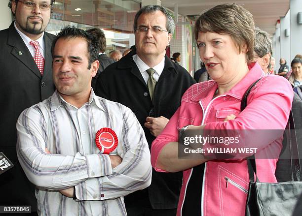 New Zealand's Labour Prime Minister Helen Clark greets former New Zealand rugby league great Stacey Jones who has endorsed her party, during a tour...