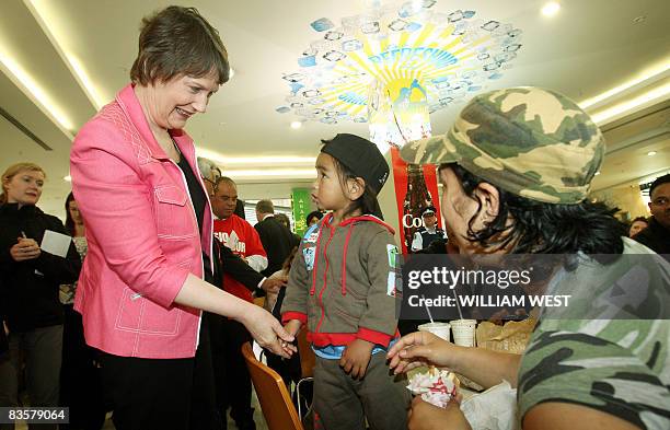 New Zealand's Labour Prime Minister Helen Clark greets people during a tour of a shopping centre in the southern Auckland suburb of Manukau, on...