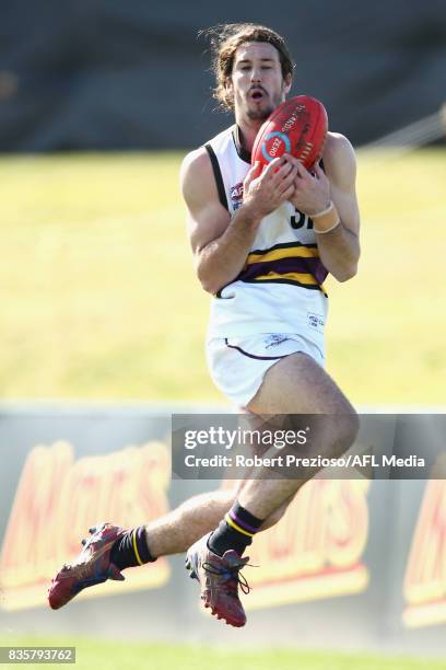 Jessy Wilson of the Murray Bushrangers marks during the TAC Cup round 16 match between the Geelong Falcons and the Murray Bushrangers at MARS Stadium...