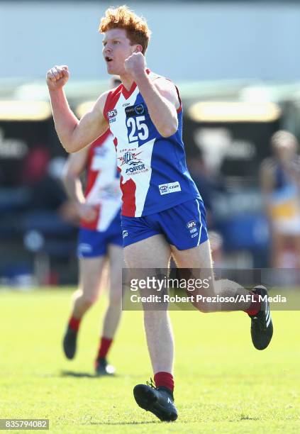 Kyle Reid of the Gippsland Power celebrates a goal during the TAC Cup round 16 match between the Gippsland Power and the Bendigo Pioneers at MARS...