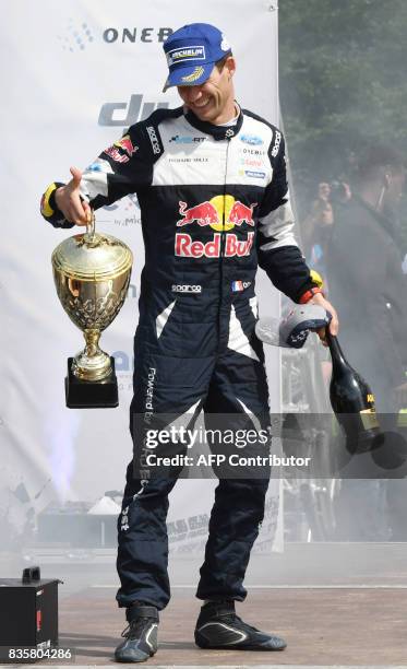 3rd place Sebastien Ogier of France leaves the stage after the flower ceremony after the WRC Germany on August 20, 2017 in Neunkirchen, western...