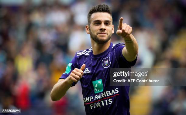 Anderlecht's Belgian midfielder Massimo Bruno celebrates after scoring a goal during the Belgian Jupiler Pro League football match between Sporting...