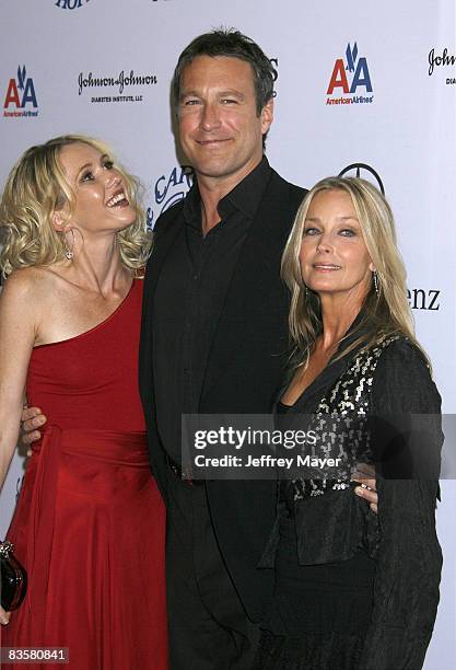 Amanda Leighton, John Corbett and Bo Derek arrive at The 30th Anniversary Carousel Of Hope Ball at The Beverly Hilton Hotel on October 25, 2008 in...