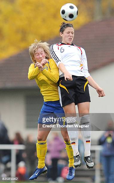 Isabel Kerschowski of Germany battles for the ball with Sofie Persson of Sweden during the women international friendly match between U20 Germany and...