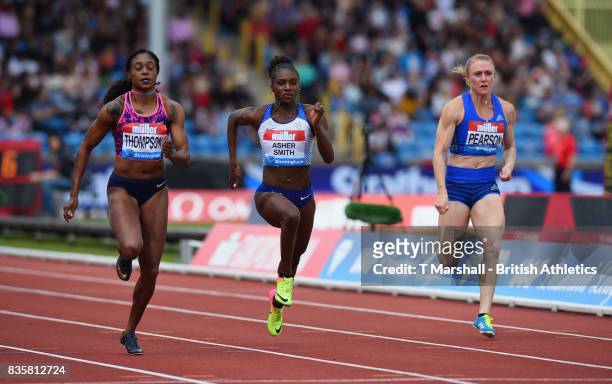 Elaine Thompson of Jamaica, Dina Asher-Smith of Great Britain and Sally Pearson of Australia compete in the Womens 100m heat 1 during the Muller...