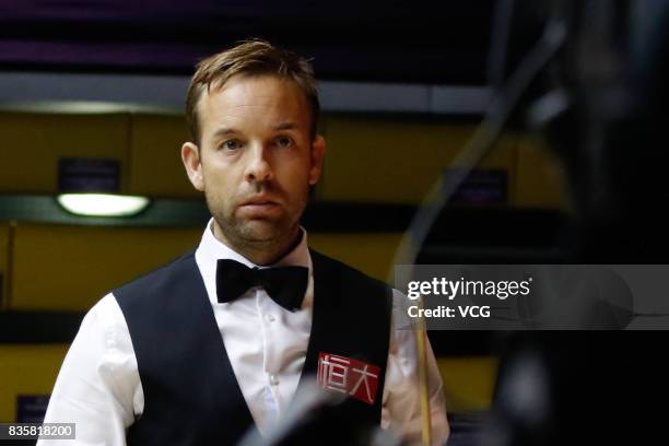 Ali Carter of England reacts during his quarterfinal match against Fergal O'Brien of Republic of Ireland on day five of Evergrande 2017 World Snooker...