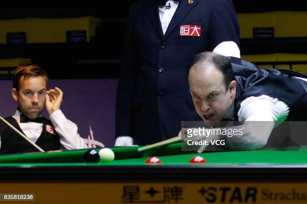 Fergal O'Brien of Republic of Ireland plays a shot during his quarterfinal match against Ali Carter of England on day five of Evergrande 2017 World...
