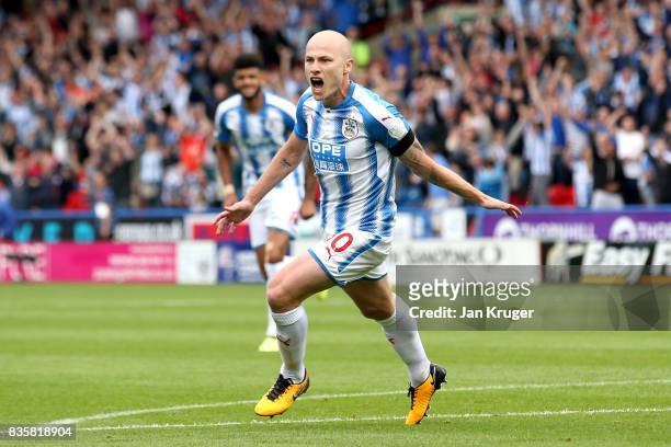 Aaron Mooy of Huddersfield Town celebrates scoring his sides first goal during the Premier League match between Huddersfield Town and Newcastle...