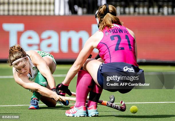 Shirley McCay of Ireland fights for the ball with Alison Howie of Scotland during the women's Rabo EuroHockey Championships 2017 match between...