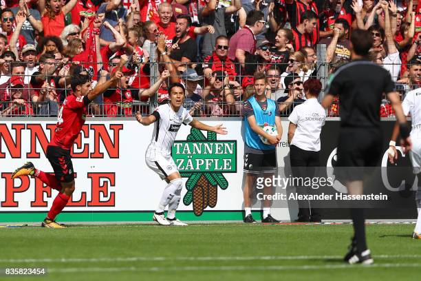 Tim Kleindienst of FC Freiburg celebrates a goal which was later disallowed by refeere Manuel Graefe following interference by the video referee,...