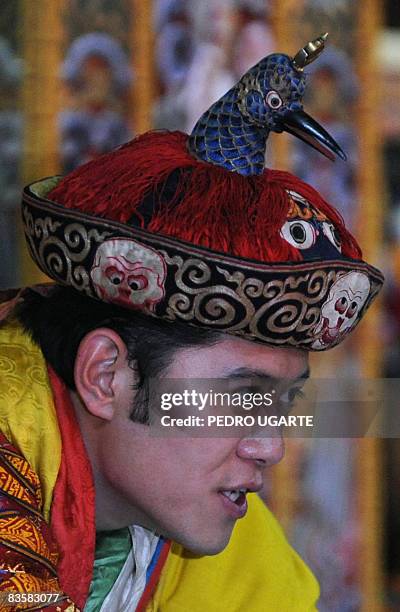 The new King of Bhutan, Jigme Khesar Namgyel Wangchuck, listens to a well-wisher at Tashichho Dzong Palace in Thimphu on November 6, 2008. The...