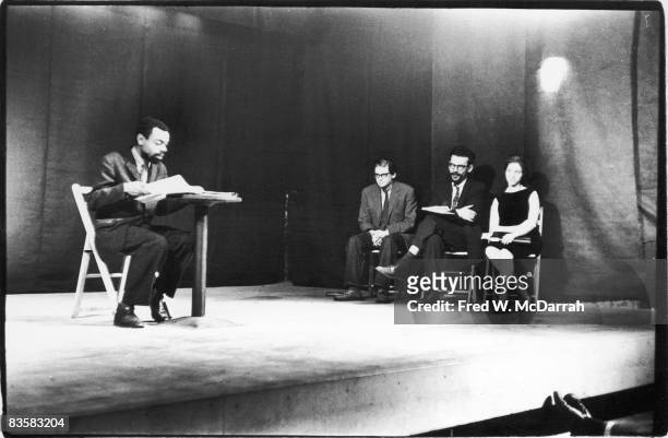American poet LeRoi Jones reads from his poem 'In Memory of Radio' at the Living Theatre, New York, New York, January 16, 1961. The reading, part of...