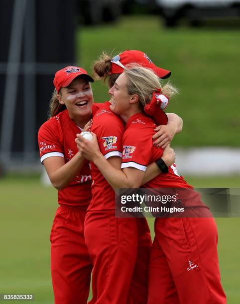 Emma Lamb of Lancashire Thunder celebrates after she takes a catch to dimiss Sarah Glenn of Loughborough Lighning during the Kia Super League match...