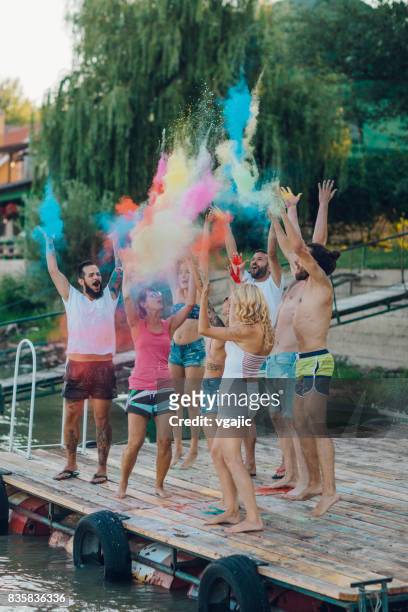 friends on summer party - party on the pier stock pictures, royalty-free photos & images