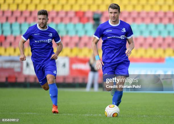 Adrijan Antunovic and Bjoern Brunnemann of VSG Altglienicke during the game between BFC Dynamo Berlin and VSG Altglienicke on august 20, 2017 in...