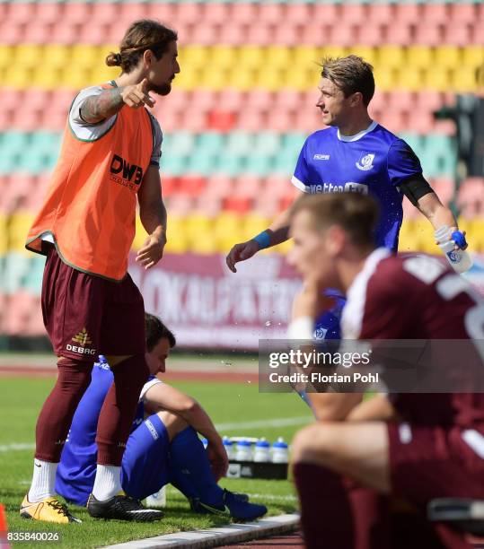 Joshua Silva of BFC Dynamo and Bjoern Brunnemann of VSG Altglienicke after the game between BFC Dynamo Berlin and VSG Altglienicke on august 20, 2017...