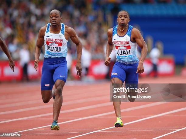 Chijindu Ujah of Great Britain wins the Mens 100m race from James Dasaolu of Great Britain during the Muller Grand Prix Birmingham meeting at...