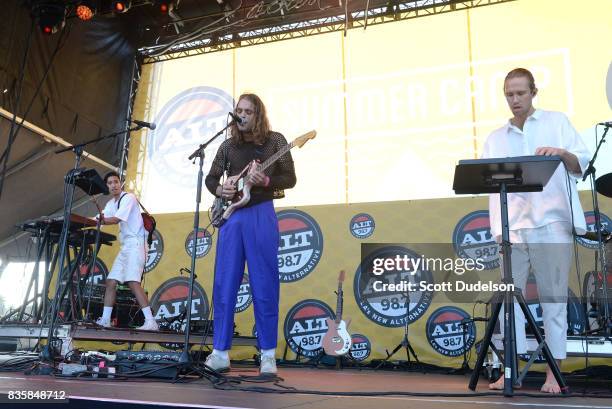 Musicians Jason Suwito, Landon Jacobs and Hayden Coplen of Sir Sly perform onstage during the Alt 98.7 Summer Camp concert at Queen Mary Events Park...