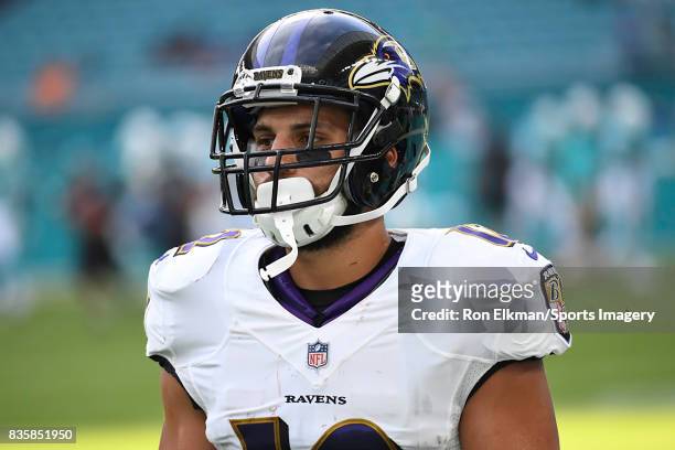 Wide receiver Michael Campanaro of the Baltimore Ravens looks on before a preseason game against the Miami Dolphins at Hard Rock Stadium on August...