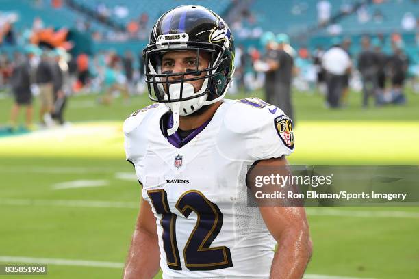 Wide receiver Michael Campanaro of the Baltimore Ravens looks on before a preseason game against the Miami Dolphins at Hard Rock Stadium on August...