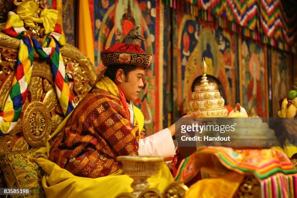 In this handout image supplied by Bhutan Government Department Of Information Technology , His Majesty Jigme Khesar Namgyel Wangchuck, King of Bhutan...