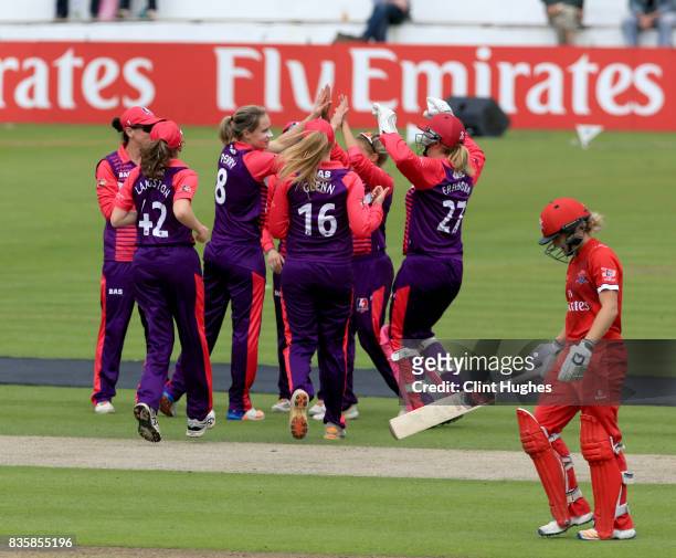 Ellyse Perry of Loughborough Lightning celebrates after she takes the wicket of Emma Lamb of Lancashire Thunder during the Kia Super League match...