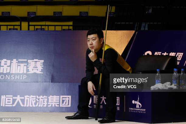 Li Hang of China reacts during his quarterfinal match against Mark Williams of Wales on day five of Evergrande 2017 World Snooker China Champion at...