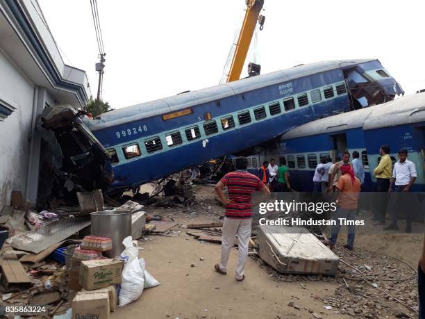 Coaches of the Kalinga Utkal Express train after it derailed in Khatauli, on August 20, 2017 in Muzaffarnagar, India. The Kalinga Utkal Express was...
