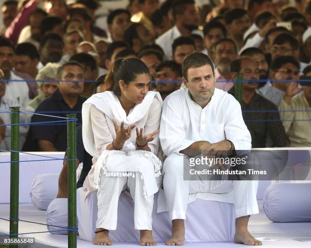 Congress Vice President Rahul Gandhi talking to his niece Miraya Vadra after paying homage to former Prime Minister Rajiv Gandhi on his 75th birth...