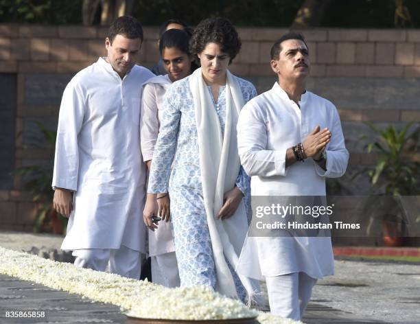 Congress Vice President Rahul Gandhi with his niece Miraya Vadra, and sister Priyanka Gandhi Vadra and Robert Vadra paying floral tributes to former...