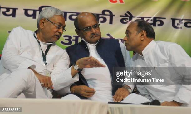 Bihar Chief Minister and JD Chief Nitish Kumar with KC Tyagi and RCP Singh at National Council Meeting of the party, on August 19, 2017 in Patna,...