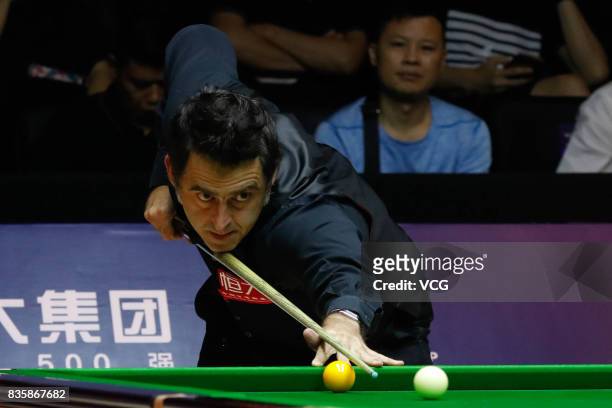 Ronnie O'Sullivan of England plays a shot during his quarterfinal match against Luca Brecel of Belgium on day five of Evergrande 2017 World Snooker...
