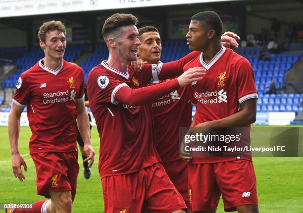 Rhian Brewster of Liverpool celebrates his goal with team mates Matty Virtue, Corey Whelan and Yan Dhanda during the Liverpool v Sunderland U23...