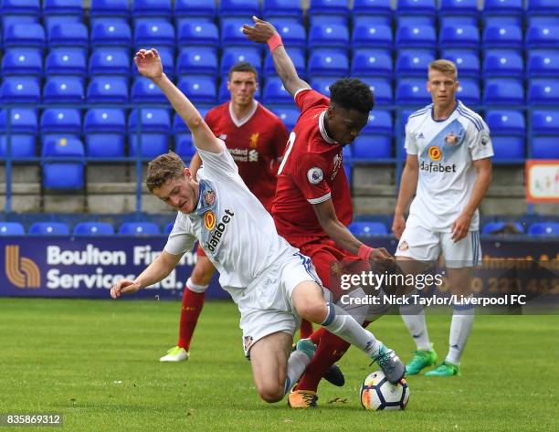 Ovie Ejaria of Liverpool and Elliot Embleton of Sunderland in action during the Liverpool v Sunderland U23 Premier League game at Prenton Park on...