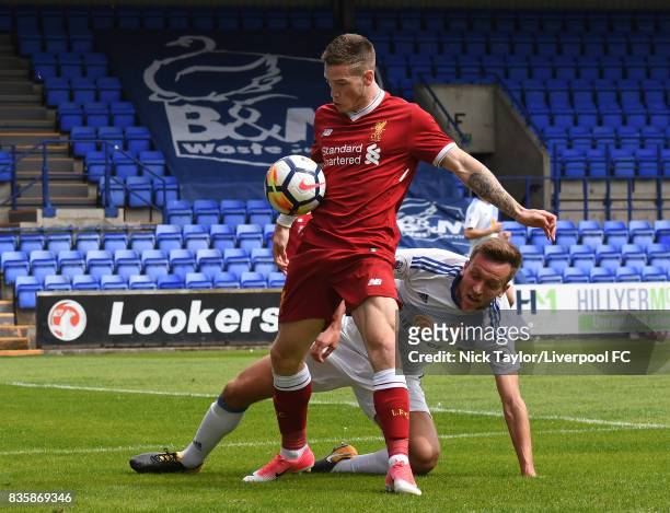 Ryan Kent of Liverpool and Joshua Robson of Sunderland in action during the Liverpool v Sunderland U23 Premier League game at Prenton Park on August...
