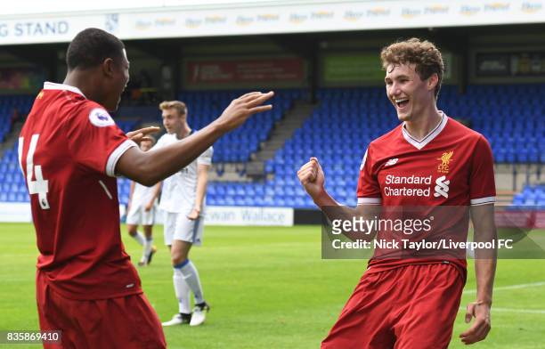 Matty Virtue of Liverpool celebrates his second goal with team mate Rhian Brewster during the Liverpool v Sunderland U23 Premier League game at...