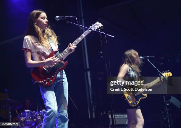 Singer Danielle Haim and Este Haim of the band HAIM perform onstage during the Alt 98.7 Summer Camp concert at Queen Mary Events Park on August 19,...