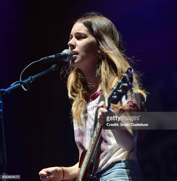 Singer Danielle Haim of the band HAIM performs onstage during the Alt 98.7 Summer Camp concert at Queen Mary Events Park on August 19, 2017 in Long...