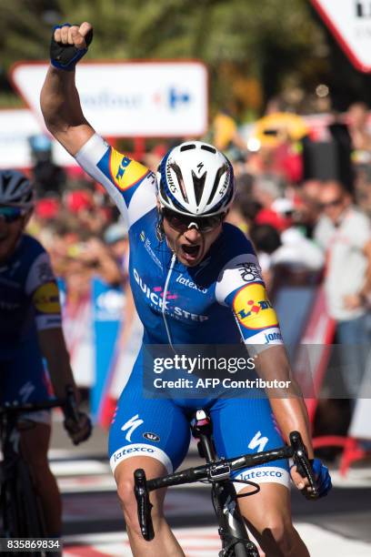 Begium's cyclist Yves Lampaert of Quick-Step Floors, celebrates as he crosses the finish line to win the 2nd stage of the 72nd edition of "La Vuelta"...