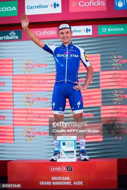 Begium's cyclist Yves Lampaert of Quick-Step Floors, celebrates on the podium after winning the 2nd stage of the 72nd edition of "La Vuelta" Tour of...