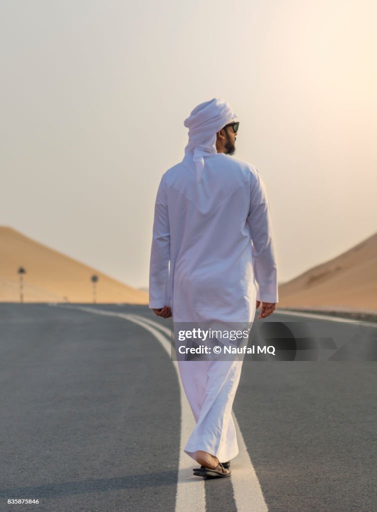 Arab man in desert, Abudhabi, United Arab Emirates