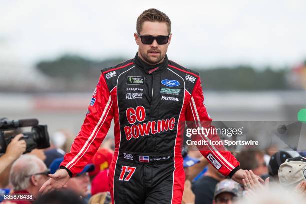 Ricky Stenhouse Jr , driver of the Go Bowling Ford, greets fans during the pre-race ceremonies of the Monster Energy NASCAR Cup Series - Pure...