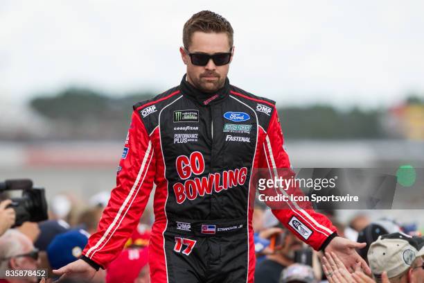 Ricky Stenhouse Jr , driver of the Go Bowling Ford, greets fans during the pre-race ceremonies of the Monster Energy NASCAR Cup Series - Pure...