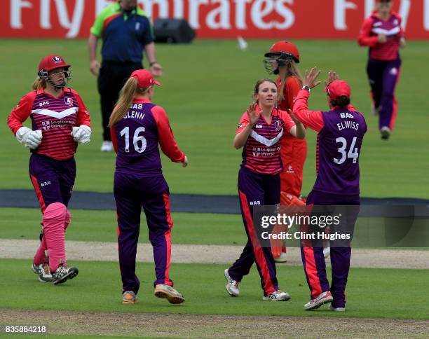 Beth Langston of Loughborough Lightning celebrates after she takes the wicket of Sophie Ecclestone of Lancashire Thunder during the Kia Super League...