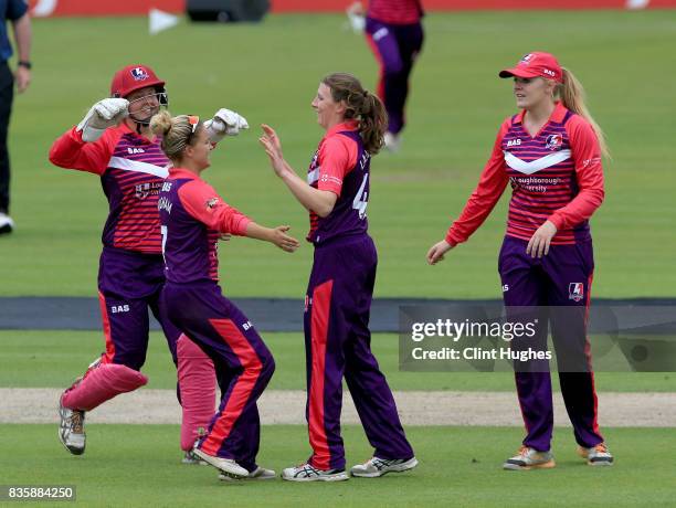 Beth Langston of Loughborough Lightning celebrates after she takes the wicket of Natasha Miles of Lancashire Thunder during the Kia Super League...