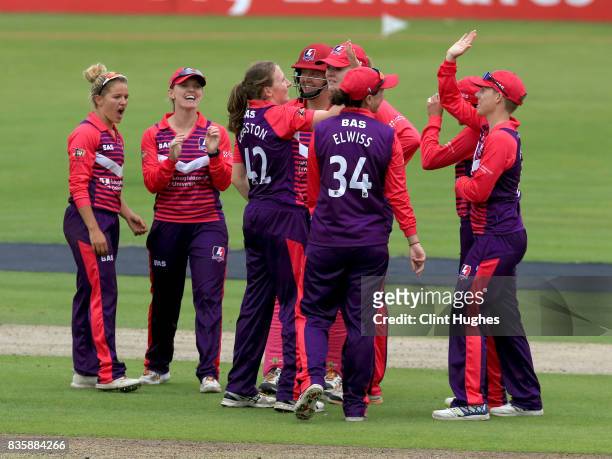 Beth Langston of Loughborough Lightning celebrates after she takes the wicket of Ellie Threlkeld of Lancashire Thunder during the Kia Super League...