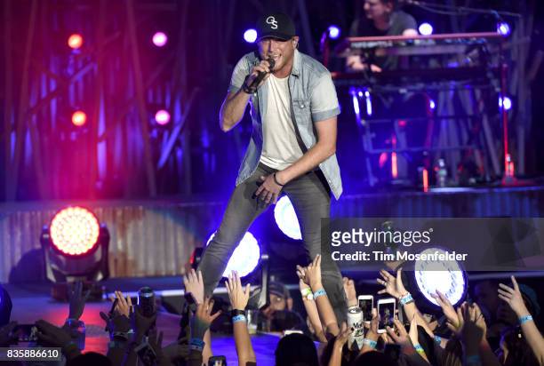Cole Swindell performs during the "What The Hell" world tour at Toyota Amphitheatre on August 19, 2017 in Wheatland, California.