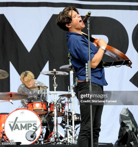 Bradley Simpson and Tristan Evans of The Vamps perform live on stage during V Festival 2017 at Weston Park on August 20, 2017 in Stafford, England.