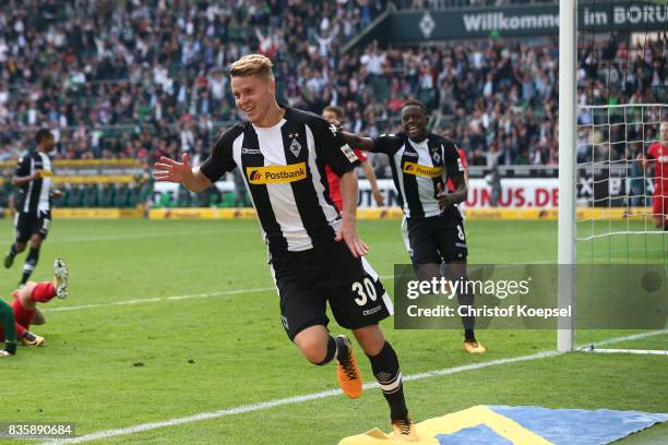 Nico Elvedi of Moenchengladbach celebrates having scored his teams first goal during the Bundesliga match between Borussia Moenchengladbach and 1. FC...